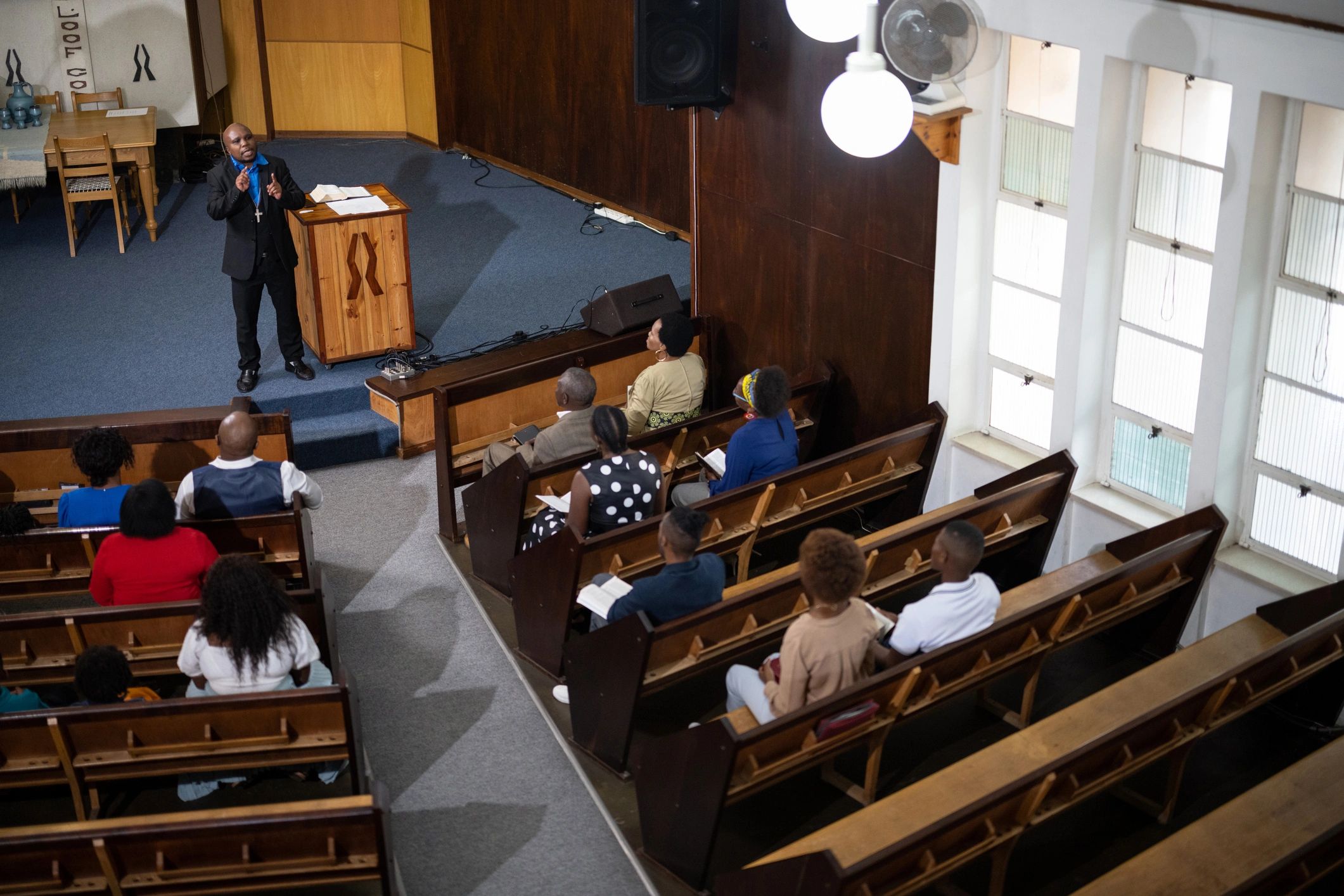 Pilgrims gathered in prayer inside a church