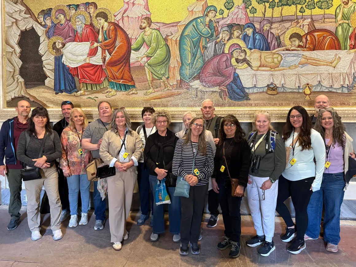 Pilgrims visiting a holy site during a Sacred Journey tour